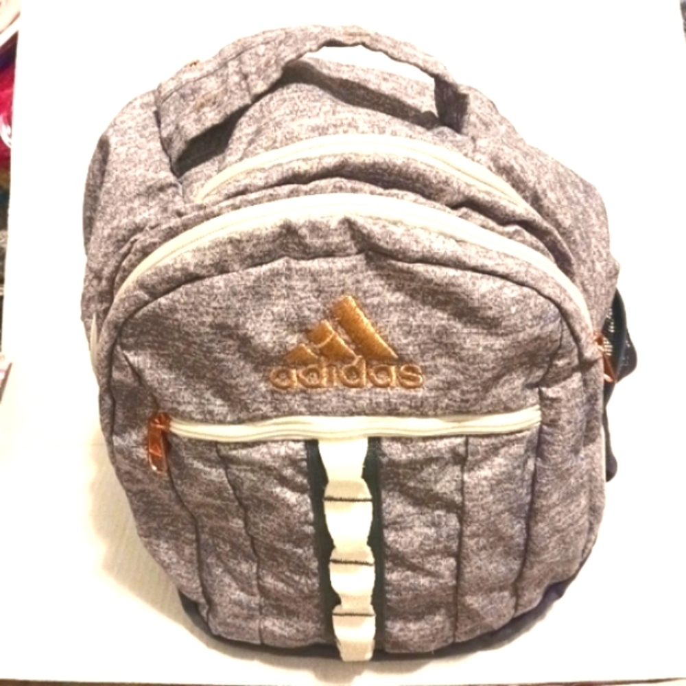 ADIDAS GRAY BACKPACK WITH FOUR ZIPPER POCKETS AND GOLD HARDWARE NWOT